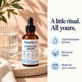 Naturly Co drops beside a glass of water — daily ritual concept
